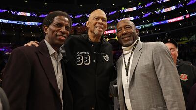 From left: former players AC Green, Kareem Abdul-Jabbar and James Worthy in California. AFP