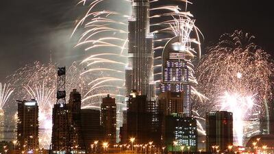 Crowds gathered in Downtown Dubai to watch the amazing fireworks at the Burj Khalifa as the city rang in the New Year. Pawan Singh / The National
