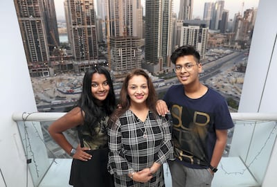 Sheetal Wanzare, with children Sarvesh and Sarvika, lives in Executive Towers in Business Bay and loves the district's community feel. Chris Whiteoak / The National