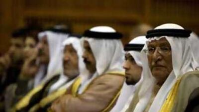 Iraqi delegates attend a conference in Damascus.