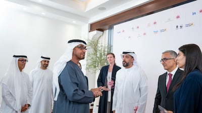 President Sheikh Mohamed speaks to representatives of organisations that have received the Parent-friendly Label at Al Shati Palace. Photo: Presidential Court