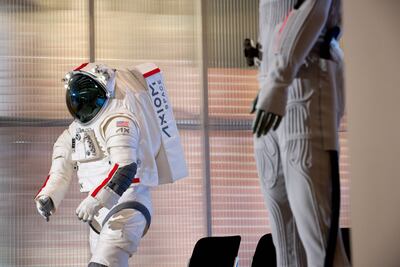 The Axiom Extravehicular Mobility Unit (AxEMU) spacesuit and the Liquid Cooling and Ventilation Garment (LCVG) on display in New York. Both have been designed by Prada and Axiom Space. Photo: Bloomberg