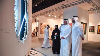 Sheikh Abdullah bin Zayed tours the galleries at Manarat Al Saadiyat. Wam