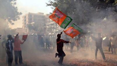Supporters of the Bharatiya Janta Party (BJP) celebrate Gujarat’s chief minister Narendra Modi's win.