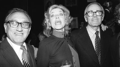 Lauren Bacall with Henry Kissinger and actor Henry Fonda at a party to launch her autobiography, By Myself at the Palace Theater in New York. AP