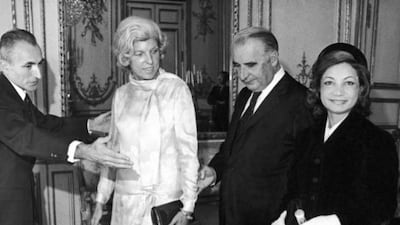 From left, chief of Elysee Palace Protocol Jacques Senard, Claude Pompidou, French president Georges Pompidou and princess Ashraf Pahlavi at the Elysee Palace in Paris. AP Photo