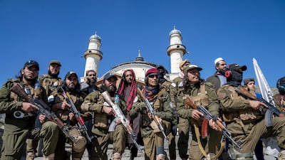 Taliban fighters in Kabul. Twenty months after the group's conquest of the capital, Afghans are suffering increased deprivation and terror. AP