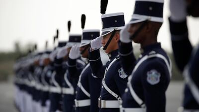 Soldiers salute during the welcome ceremony for Pope Francis. AP Photo