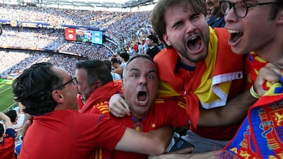 Spain fans cheer after their team scores the first – and winning – goal during the 2026 World Cup final against Argentina. AFP