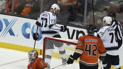 Los Angeles Kings centre Jeff Carter, No 77, celebrates his goal on Anaheim Ducks goalie John Gibson, No 36, in the second period of their hockey game in Anaheim. Reed Saxon / AP Photo