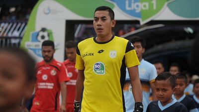 Persela goalkeeper and captain Choirul Huda, 38, died following an on-pitch collision with a teammate during a in the Go-Jek Traveloka league match on Sunday. Juni Kriswanto / AFP