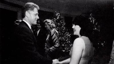 Monica Lewinsky, the world’s most famous intern, meets President Clinton at a White House function. AP Photo