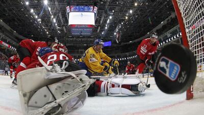 Sweden’s Johan Sundstrom scores a goal against Switzerland during the IIHF World Championship in Moscow, Russia. Grigory Dukor / Reuters