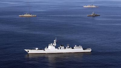 In this photo made available by the Iranian Army office on December 28, 2019, a view of warships during joint Iran-Russia-China naval drills in the Indian Ocean and the Gulf of Oman. AFP PHOTO / HO / Iranian Army office
