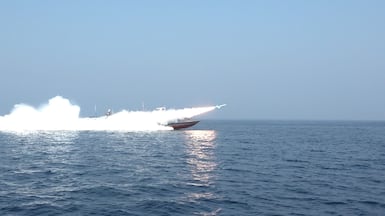 The IRGC conducts a military drill in the Strait of Hormuz, which is a key route for the world's crude oil market. EPA