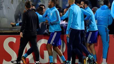 In a Europa League tie in 2017, Patrice Evra, then with Marseille, was sent off before the game started as he attempted to kick a fan on the sidelines during the pre-match warm-up for the tie against Vitoria. Evra had been poor at Marseille and the fans were not happy. Travelling supporters aimed chants in his direction and then they broke past the stadium barriers. Evra aimed a high kick over the advertising boards towards a fan on the sidelines. He was sent off for violent misconduct, fined €10,000 (Dh40,000) by UEFA and was banned from playing in European competitions until the next summer. He was also fired by Marseille, his contract immediately terminated. AFP