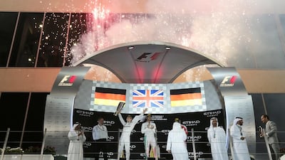 Nico Rosberg of Germany and Mercedes-GP celebrates placing second and clinching the world championship. Christopher Pike / The National