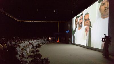 Attendees of the Meydan One launch watch a video featuring Sheikh Mohammed Bin Rashid. Duncan Chard for the National.