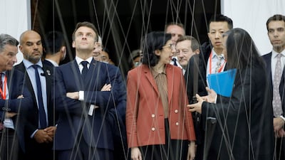 Mr Macron at the Red Brick Museum in Beijing. AP