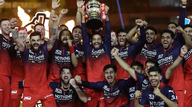 Cricket - Indian Premier League - IPL - Final - Royal Challengers Bengaluru v Gujarat Titans - Narendra Modi Stadium, Ahmedabad, India - May 31, 2026 Royal Challengers Bengaluru's Rajat Patidar lifts the trophy as he celebrates with teammates after winning the Indian Premier League REUTERS / Amit Dave