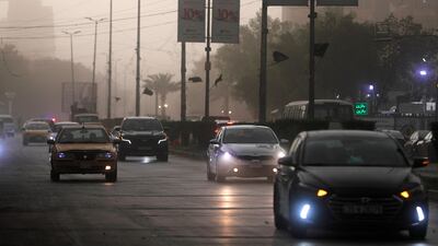 Traffic during a sandstorm in Baghdad. AFP