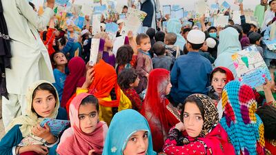 Volunteers hold a rally in support of girls' right to education in Afghanistan.