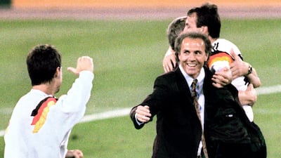 West Germany coach Franz Beckenbauer, centre, celebrates after his team beat the defending champions Argentina 1-0 in the World Cup final, July 8, 1990 in Rome. AFP