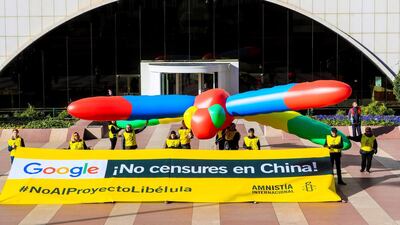 Members of Amnesty International protest at the headquarters of Google in Madrid, Spain. EPA