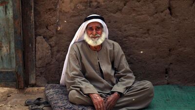Palestinian refugee Sulaiman al-Namodi, 92, sits outside of his house in Gezirat al-Fadel village, Sharqiya, about 150 kilometers east of Cairo, Egypt.