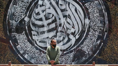 Bilal Khaled and artwork at Alazhar University in Gaza City