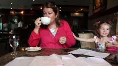 Imelda Popplewell, seen with her daughter Katie, 3, says her diary reveals that she spends too much on eating out in malls with her family.