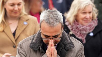 On Friday, people attended a Covid-19 pandemic anniversary remembrance event and minute's silence at the National Memorial Arboretum, at Alrewas in Staffordshire, to mark two years since the World Health Organsation declared a global pandemic. PA