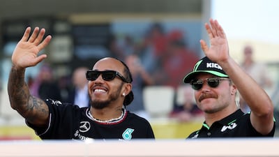 Mercedes driver Lewis Hamilton and Kick Sauber driver Valtteri Bottas during the drivers' parade.