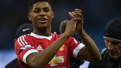 Marcus Rashford applauds supporters after Manchester United's 1-0 win over Manchester City in the derby on Sunday.