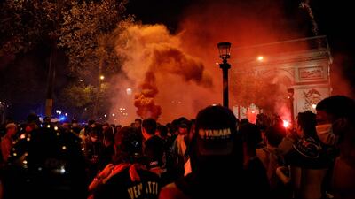 Paris Saint-Germain fans celebrate in Paris. AFP
