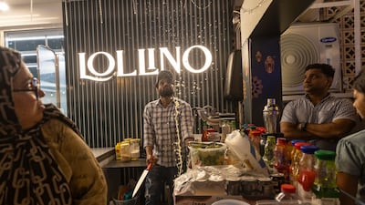 A worker at one of the stalls