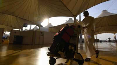 A Muslim pilgrim arrives at King Abdulaziz International Airport in Jeddah, Saudi Arabia, before the annual Hajj pilgrimage in the holy city of Makkah. AFP