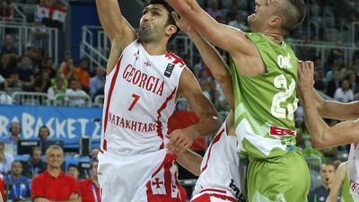 Georgia's Zaza Pachulia of the Dallas Mavericks goes up against Slovenia's Alen Omic during EuroBasket 2015 on Sunday. Antonio Bat / EPA