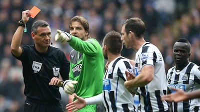 Newcastle players react to Mapou-Yanga-Mbiwa's red card on Saturday. Ian MacNicol / AFP
