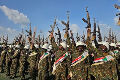 Members of the army-affiliated Sudanese Armed Popular Resistance Force take part in a military parade for fresh graduates in Al Qadarif state, in eastern Sudan on May 20. AFP