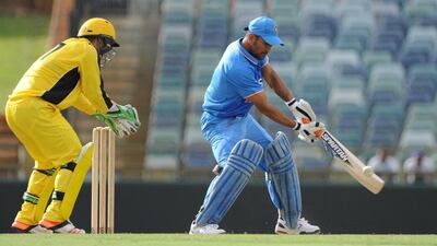 MS Dhoni plays a shot during the one-day cricket match between India and a Western Australian XI in Perth on January 9, 2016. Greg Wood / AFP