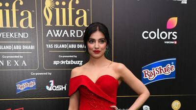 Divya Khosla Kumar wearing a red off-the-shoulder dress. AFP