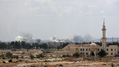 Smoke billowing from the Palestinian camp of Yarmouk, south of the Syrian capital Damascus. AFP