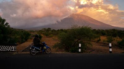 The eruption seen from Kubu Village. Made Nagi / EPA
