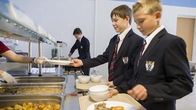 Pupils at Brighton College in Al Ain queue for lunch at Slices cafeteria. School food was the focus of one of many FNC debates in 2014. Antonie Robertson / The National