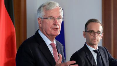 Michel Barnier (L). The pound's instability has again been evident amid Brexit uncertainty. AP