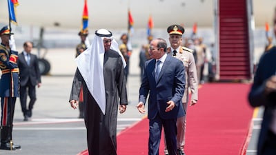 President Sheikh Mohamed was welcomed by Egyptian President Abdel Fattah El Sisi at Cairo International Airport. Photo: UAE Presidential Court