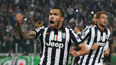 Carlos Tevez of Juventus celebrates his winning goal in the first leg of the Champions League semi-final against Real Madrid on Tuesday night in Turin. Stefano Rellandini / Reuters