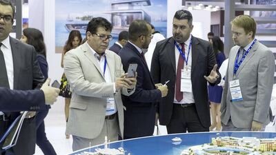 Above, visitors to the Heart of Europe project by Kleindienst Group. Antonie Robertson / The National