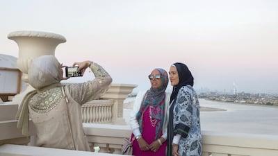Visitors take a moment for the 'Gram. Photo: Leslie Pableo for The National